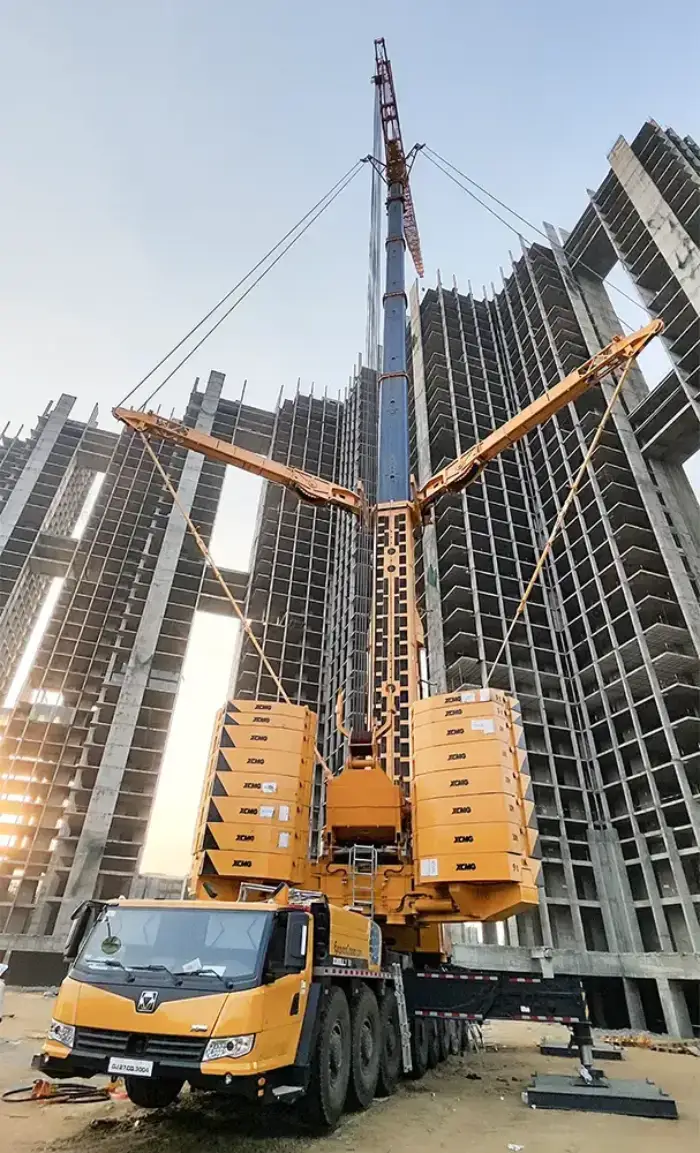 Telescopic boom crane operating at Oberoi Gurugram construction site